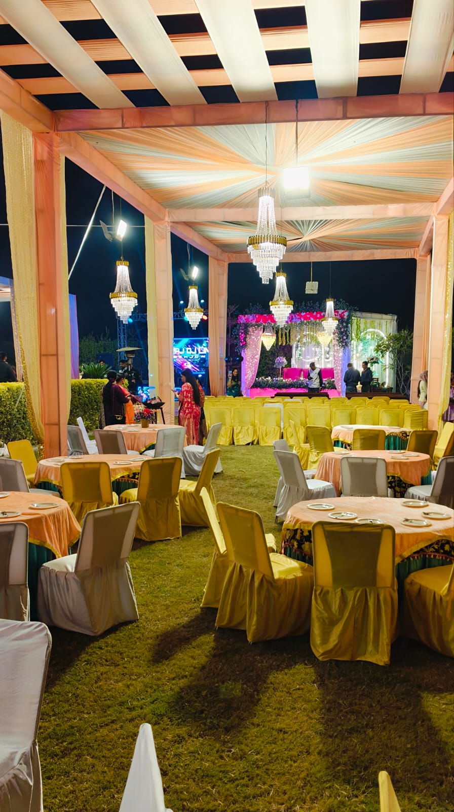 Guest seating area in banquet hall at Vani Hotels Una